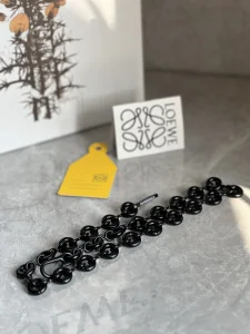 Essenceofluxury Womens Strap You Loewe Donut Chain Shoulder Strap in Black A104PP280 AA201984