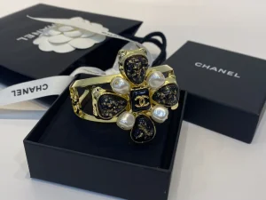 Chanel CC Cross Bangle Bracelet Black