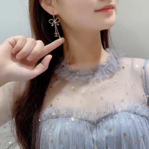 Chanel CC Bowknot Leather Earrings