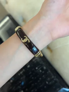 Chanel CC Black Gold Cuff Bracelets