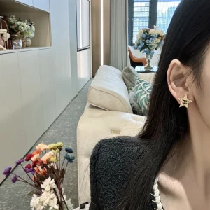 Chanel CC Gold Star Earrings